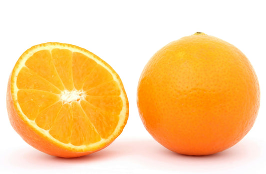 Orange cut in half on a white background